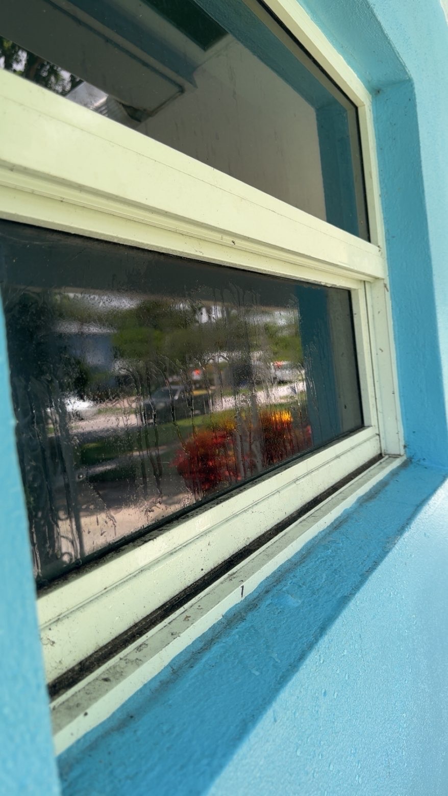 Before — Awning window · streaks & water spots cleared